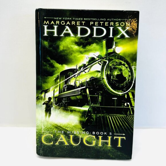 The Missing: Book 5 Caught Hardcover Book by Haddix, Margaret Peterson - Picture 1 of 7
